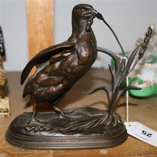 After Jules Moigniez  A brown patinated bronze model of a partridge eating millet, height 7in., legs repaired(-)